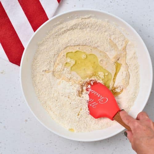 Stirring Healthy Biscotti dough ingredients.