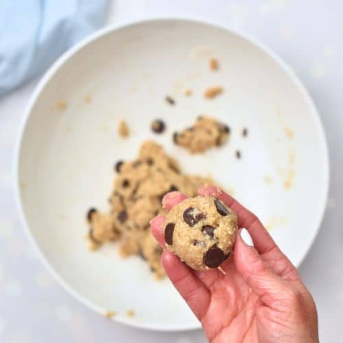 Rolling Healthy Chocolate Chip Cookie dough balls.