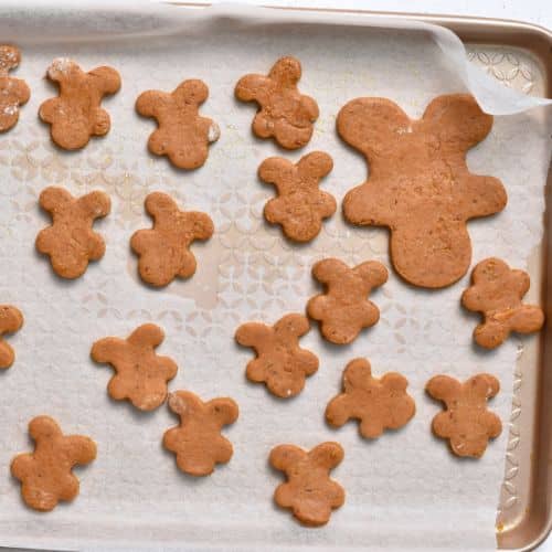 Healthy Gingerbread Cookies ready to cook on a baking sheet.