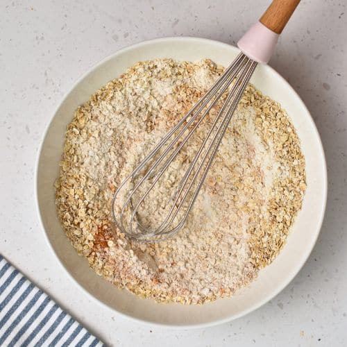 Dry Healthy Oatmeal Cookie dough ingredients in a large mixing bowl.