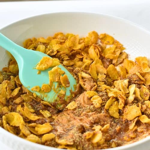 Dry Peanut Butter Cornflakes Bar base ingredients in a mixing bowl.