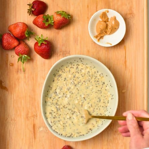 Stirring Gluten-Free Porridge with a fork.