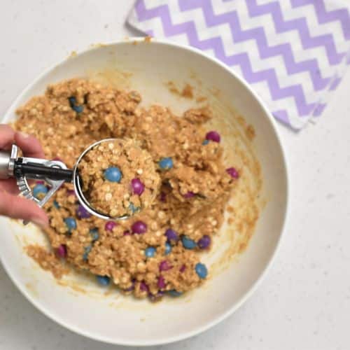 Forming Healthy Monster Cookie dough balls.