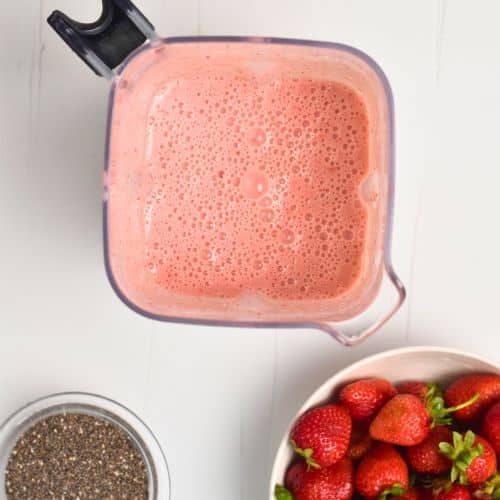 Pink milk for the Strawberry Chia Seed Pudding in a jug.