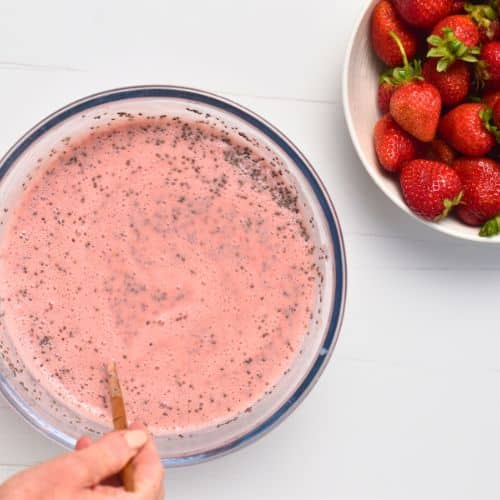 Stirring the Strawberry Chia Seed Pudding mixture.