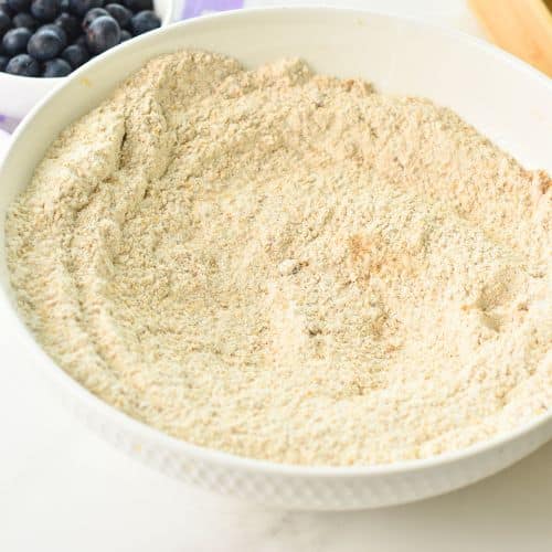 Dry Whole Wheat Blueberry Muffin ingredients in a bowl.