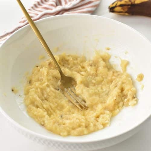 Mashed banana in a bowl,