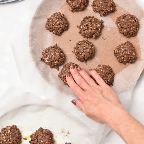 Flattening the 3-Ingredient No-Bake Cookies on a plate.