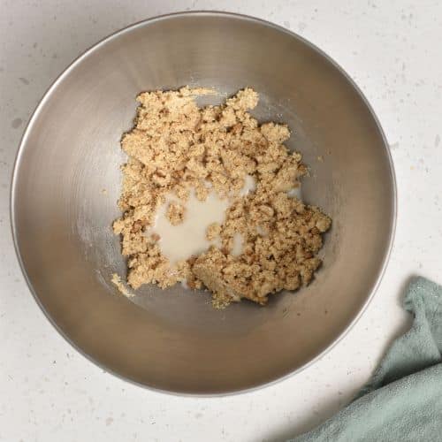 Adding milk to the butter mixture.