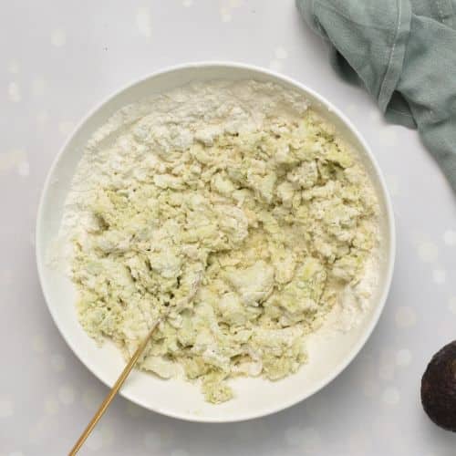 Avocado Biscuits ingredients mixed in a large mixing bowl.