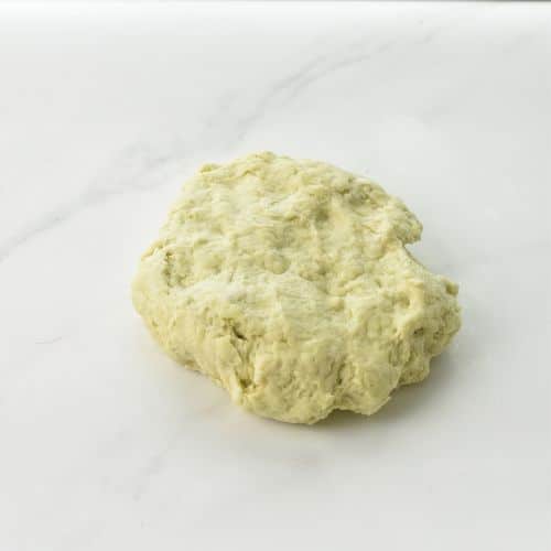 Avocado Biscuit dough on a benchtop.