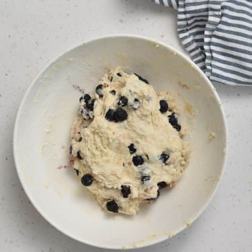 Blueberries incorporated in the Blueberry Bagels in a bowl